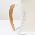 Detailed side view of luxury wide headband featuring white pearls and non-slip suede lining - Twill White