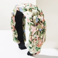 Detailed macro of the braided texture and floral pattern on the wide fabric headband - Green Gradient