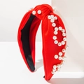Vue détaillée du serre-tête noué rouge orné de perles sur tissu en maille douce - Rouge - Perles Ondulées