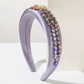Close-up of purple satin headband featuring intricate rhinestone inlay and jewelry details - Purple