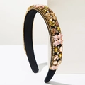 Macro side view of baroque padded headband with multi-color crystals and rhinestones - Brown