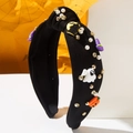 Detail of Halloween knotted headband featuring ghosts, pumpkins and shiny rhinestones - Black