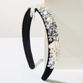 Baroque retro headband featuring rhinestones and white pearls on black velvet fabric - White