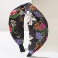 Detail of bohemian knotted headband with white lily and purple peony floral print - Iridescent Black
