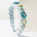 Detail of light blue tweed headband with dark blue rhinestones and white daisy charms - Blue