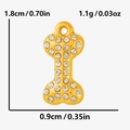 Detalle macro de colgante de hueso con diamantes de imitación y medidas de tamaño precisas - Dorado Circonita Blanca