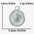 Macro view of blue enamel sea turtle pendant with size measurements 1.6cm by 1.3cm - Pendant Only (No Chain) / Silver Blue Style (S2087-S-S)