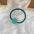 Cute dark green hair tie with a light blue transparent smiley face pendant charm - Blue Smile Face