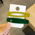Minimalist geometric hair clip set featuring lime green cutout and dark green solid styles - Dark Green + Bean Green
