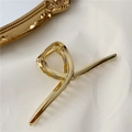 Pince à cheveux élégante en métal doré avec un design torsadé minimaliste - Or Brillant