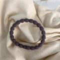 Dark purple high-elasticity wave textured hair tie for women on linen background - Gray