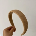 Detail of light brown hand-woven headband with herringbone texture and soft velvet lining - Khaki