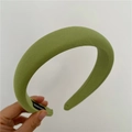 Detail of avocado green padded sponge headband with handmade label and twill fabric - Green