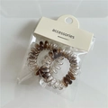 Set da due elastici per capelli a spirale con stampa leopardata marrone e grigia e tag - Trasparente