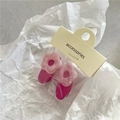 Pink floral resin hair clips set of two with retail card on white wrinkled paper - Rose Red