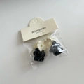 Mini jelly flower hair clips set in black and creamy white on a display card - Flower Black and White