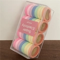 Set elastici per capelli colorati macaron in scatola trasparente con morbidi toni crema - Colori Crema Chiaro