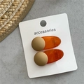 Summer style pair of matte yellow and jelly orange translucent oval hair clips for women - Coffee Round Style