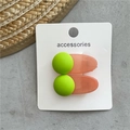 Green and orange jelly texture floral hair clips on a white accessories card - Green Round Style