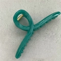 Glossy emerald green jelly hair claw clip with large crisscross design for thick hair - Cyan