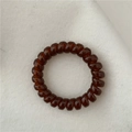 Deep amber spiral phone cord hair tie with jelly texture for elastic hair styling - Dark Coffee