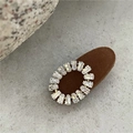 Elegant gold round hair clip with baguette-cut clear gemstones and velvet base - Coffee Oval