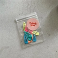 Detail of colorful macaron snap clips in a transparent thank you gift packaging - Mixed Waterdrop Shape (J4.3)