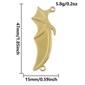 Macro detail of 18k gold plated bat wing pendant with 47mm length and 5.8g weight - Gold