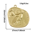 Detail view of 18k gold owl pendant with 32mm height and 5.8g weight dimensions - Gold