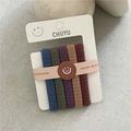 Détail de cinq élastiques à cheveux en tissu côtelé coloré à haute élasticité sur carte - Multicolore Profond