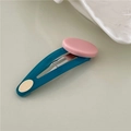 Detalle de la pinza ovalada BB con parche de resina rosa y textura de gelatina cian - A3.1 Rosa Ovalado