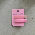 Détail d'un lot de barrettes à cheveux roses mates et brillantes sur carte de support - Style Rectangle Rose / Rose