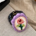 Detailed close-up of handmade purple wool felt flower hair tie with pink rose embroidery - Purple Oval Style (J5-C10) / Purple Oval