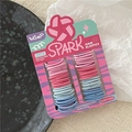 Close-up of pink and blue baby elastic hair bands on a minimalist textured tray - Dark Watermelon Red
