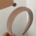 Detail shot of a thick velvet headband in light coffee with a soft plush texture - Khaki Pink