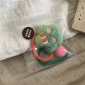 Detail of handmade wool felt flower hair clips and elastic hair ties set in packaging - Star Hair Tie (B3.5) / Set of 2 / Green