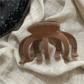 Detail of flocking wave pattern hair claw clip with dark brown velvet texture finish - Brown Pumpkin