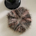 Macro shot of fluffy brown and beige multi-tone plush scrunchie with soft textured fabric - Scrunchie / Green Gradient