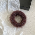 Detail of dark coffee plush scrunchie with subtle colorful fibers on white texture - Dark Coffee