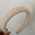 Detail of thickened oatmeal plush headband showing soft faux fur texture and inner grip - Off White