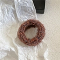 Close-up of soft plush knit hair tie with colorful wool blend yarn and elastic texture - Medium Coffee