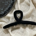 Elegant black flocked velvet hair claw clip with a geometric wave design on a soft fabric base - Black Cross