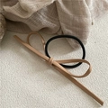 Detail of minimalist khaki PU leather bow knot on elastic hair tie for ponytails - Bowknot Hair Tie / Khaki