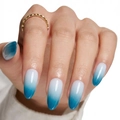 Close-up of glossy ice-blue gradient almond press-on nails with a minimalist look - Cdmj-22-12