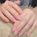 Close-up of minimalist French press-on nails with nude pink base and thin white tips - Cdj-1-85