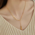 Elegante gouden Y-halsketting van titaniumstaal met ovale schakels en rechthoekige hanger - Goud (Geluk Goudstaaf)