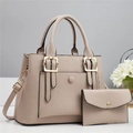 Detail view of beige tote bag and wallet set with litchi texture and gold metal buckle - Bag and Pouch / Apricot