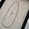 Bohemian multicolored beaded necklace with a white baroque pearl and gold accents - Shoushan Stone Necklace