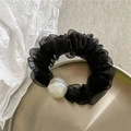 Detail of black organza scrunchie with large iridescent pearl on textured background - Mesh Scrunchie With Beads / Black
