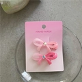 Détails de barrettes à nœuds rose dégradé avec strass sur carte de présentation - Rose Bonbon (B2.4)